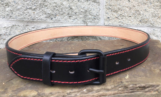 Heavy leather lined belt with red stitching